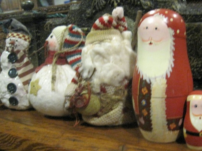 Santa and snowmen on our mantle.